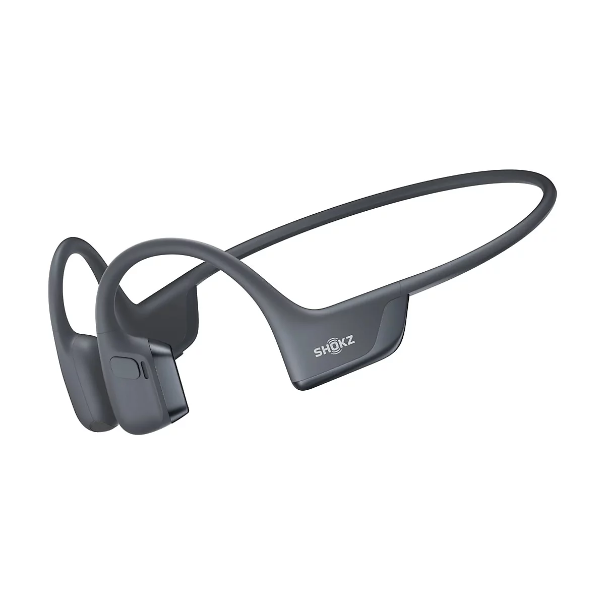 Grauer Knochenschallkopfhörer mit dem Schriftzug SHOKZ. Die Kopfhörer liegen vor weißem Hintergrund.
