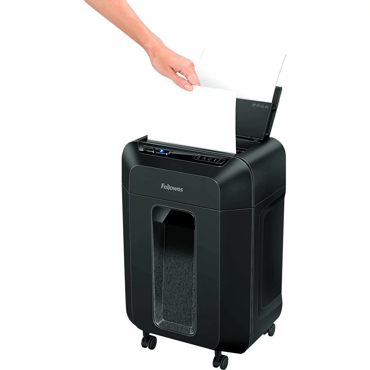 Person is putting paper into a black Fellowes paper shredder.