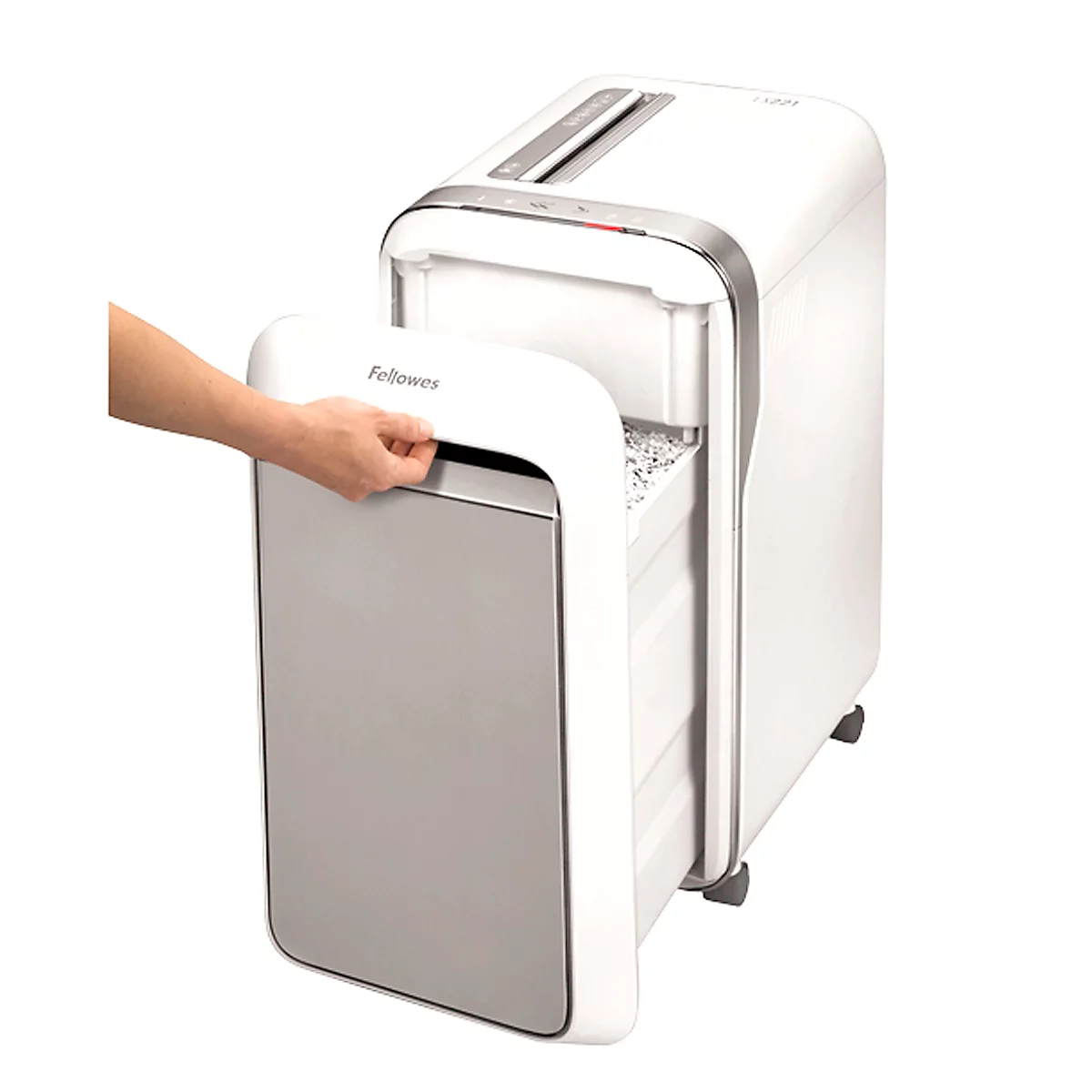 A hand opens the door of a white paper shredder. The housing has silver accents and rollers at the bottom.