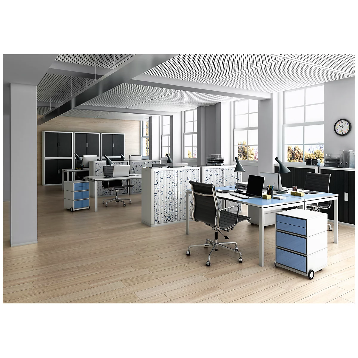 Office with desks, chairs, cabinets, and windows.
