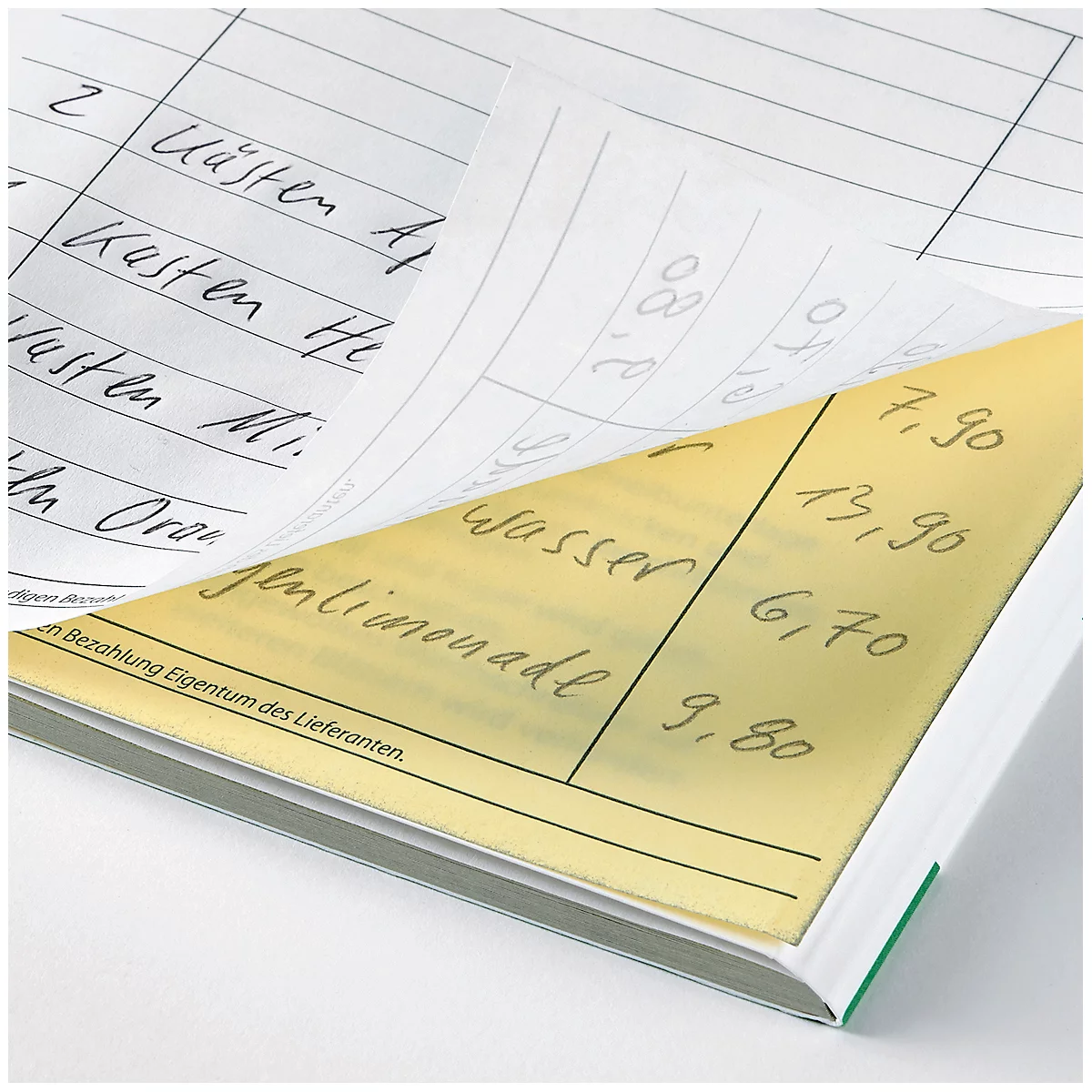 Close-up of an open order book. The pages show handwritten entries of items and prices. The page is partially yellow.