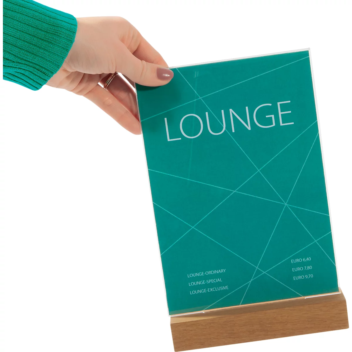 A hand holds a table card with the word LOUNGE, standing on a wooden base. Green lines and text in the background.