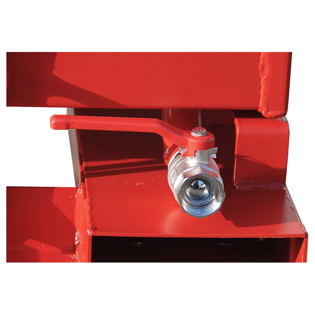 Detailed shot of a red valve with a silver ball valve on a red steel structure.