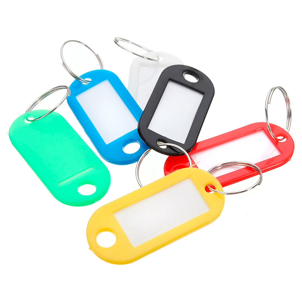 Diverse gekleurde sleutelhangers met beschrijfbare labels.