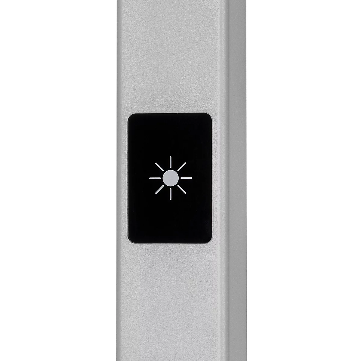 Nahaufnahme eines silbernen Geräts mit einem schwarzen Rechteck und einem Lichtsymbol.
