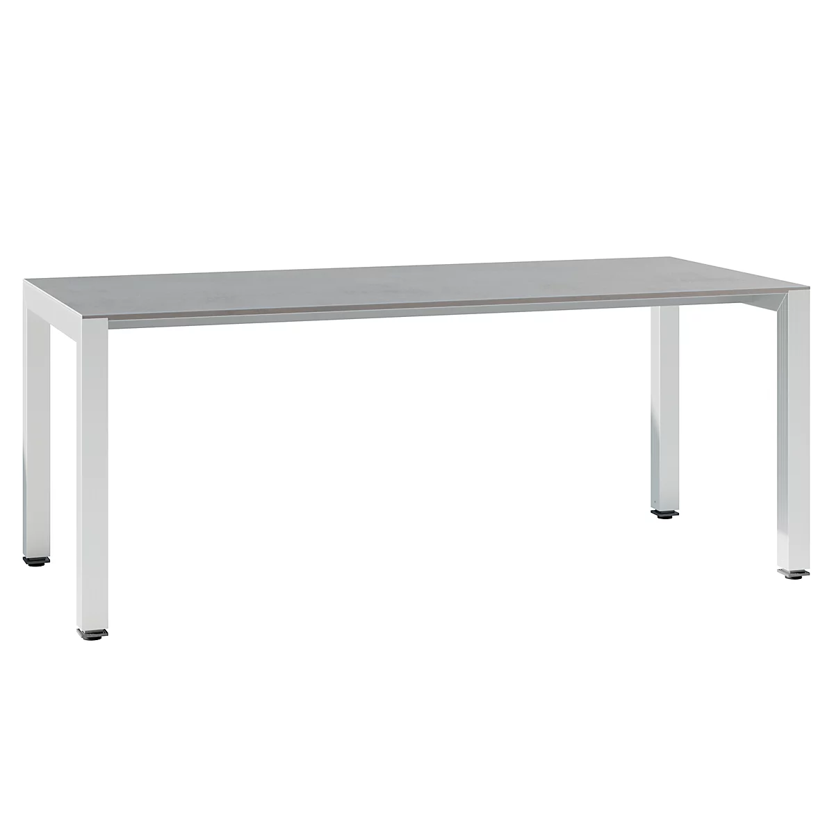 A rectangular table with a grey, smooth top and silver legs. The legs are placed at the corners of the table.