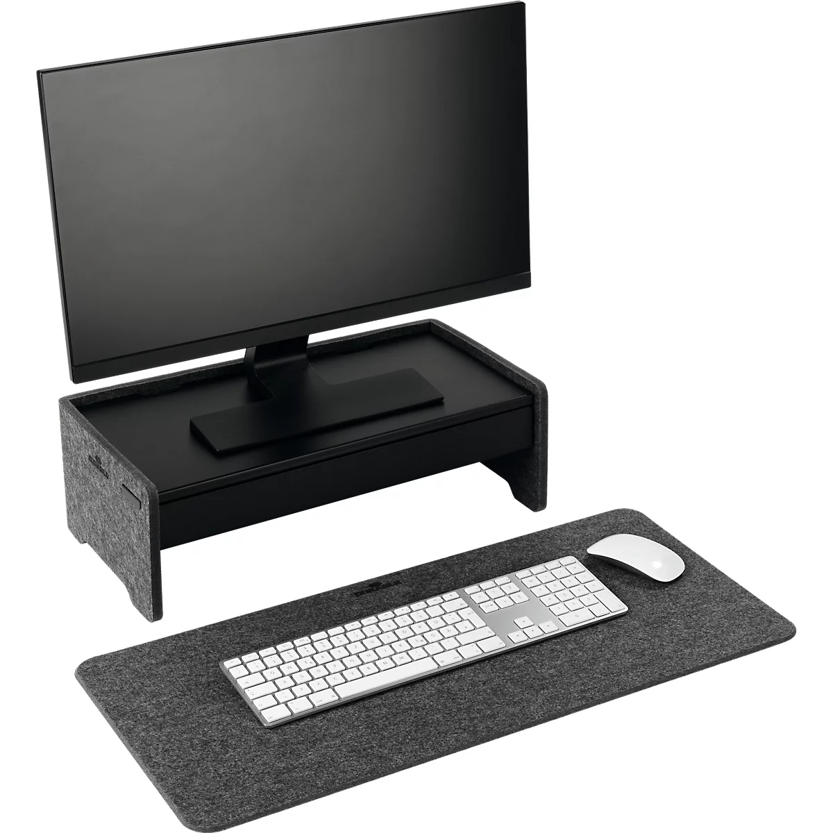 Écran noir sur un support avec clavier, souris et coussinet en feutre gris.