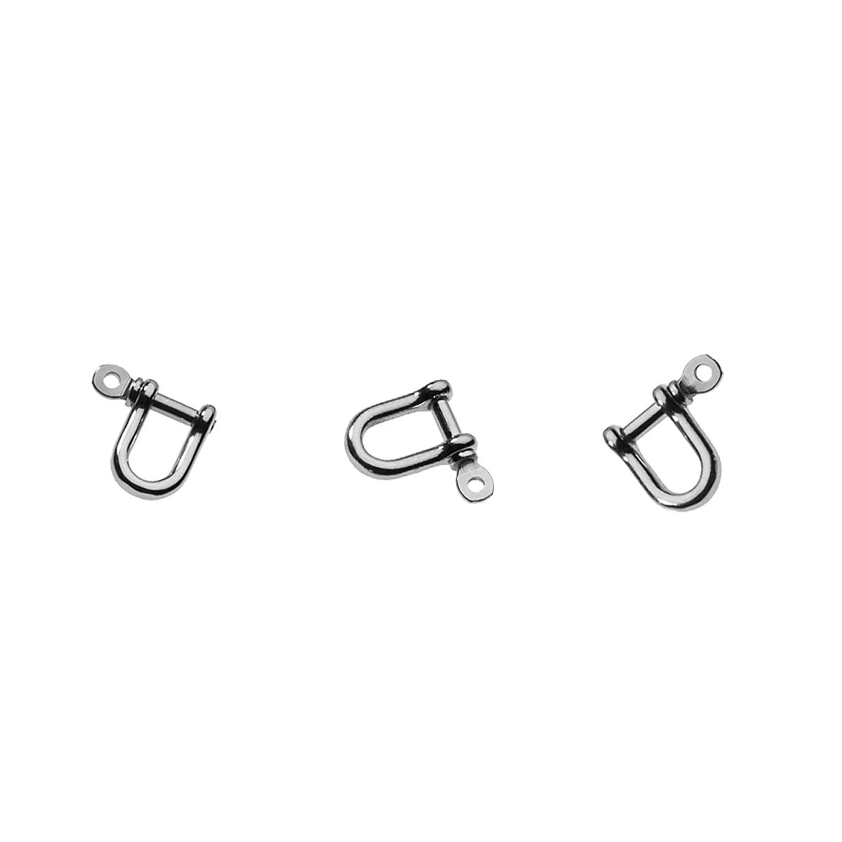 Three silver metal shackles on a white background.