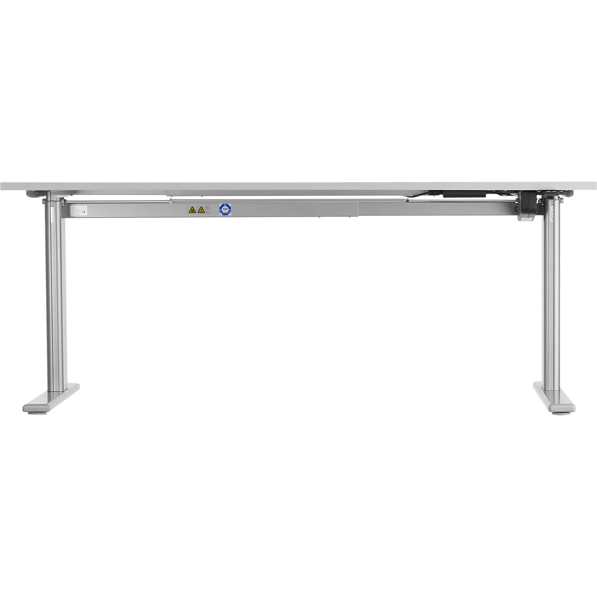 A height-adjustable desk in light gray. The frame is made of metal, the table top is light. The height is variable.