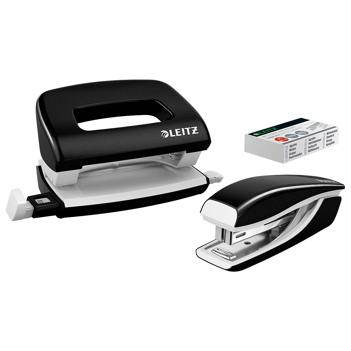 Black Leitz hole punch and stapler. Also a box of staples.