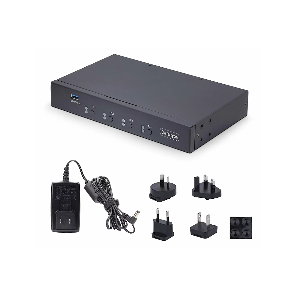 Commutateur noir avec port USB, alimentation et diverses prises sur fond blanc.