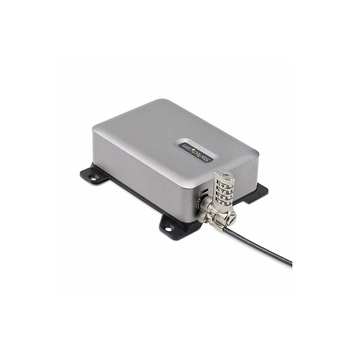 Grauer Metallkasten mit Zahlenschloss, an dem ein schwarzes Kabel befestigt ist. Auf der Oberfläche steht "StarTech.com".