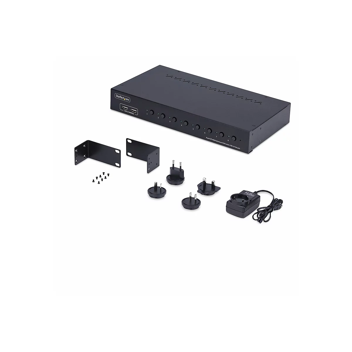 Un commutateur KVM noir avec des accessoires sur fond blanc, avec le logo StarTech.com. Les accessoires comprennent des supports, des vis, diverses fiches d'alimentation et une alimentation électrique.