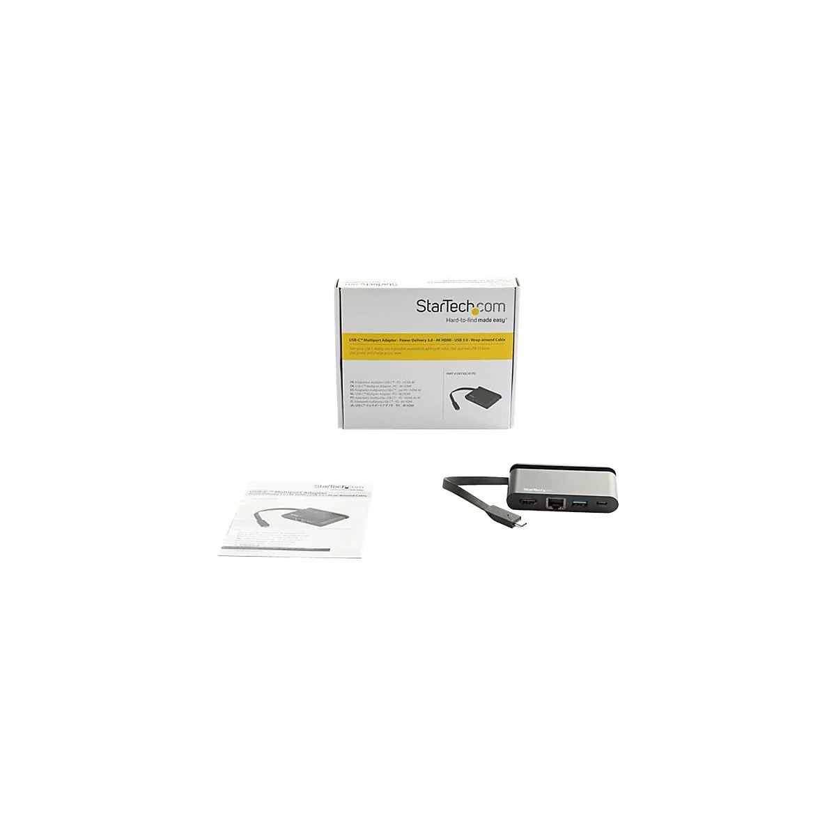 Ein USB-C-Multifunktionsadapter mit Verpackung und Handbuch. Das Produkt ist silber-schwarz.