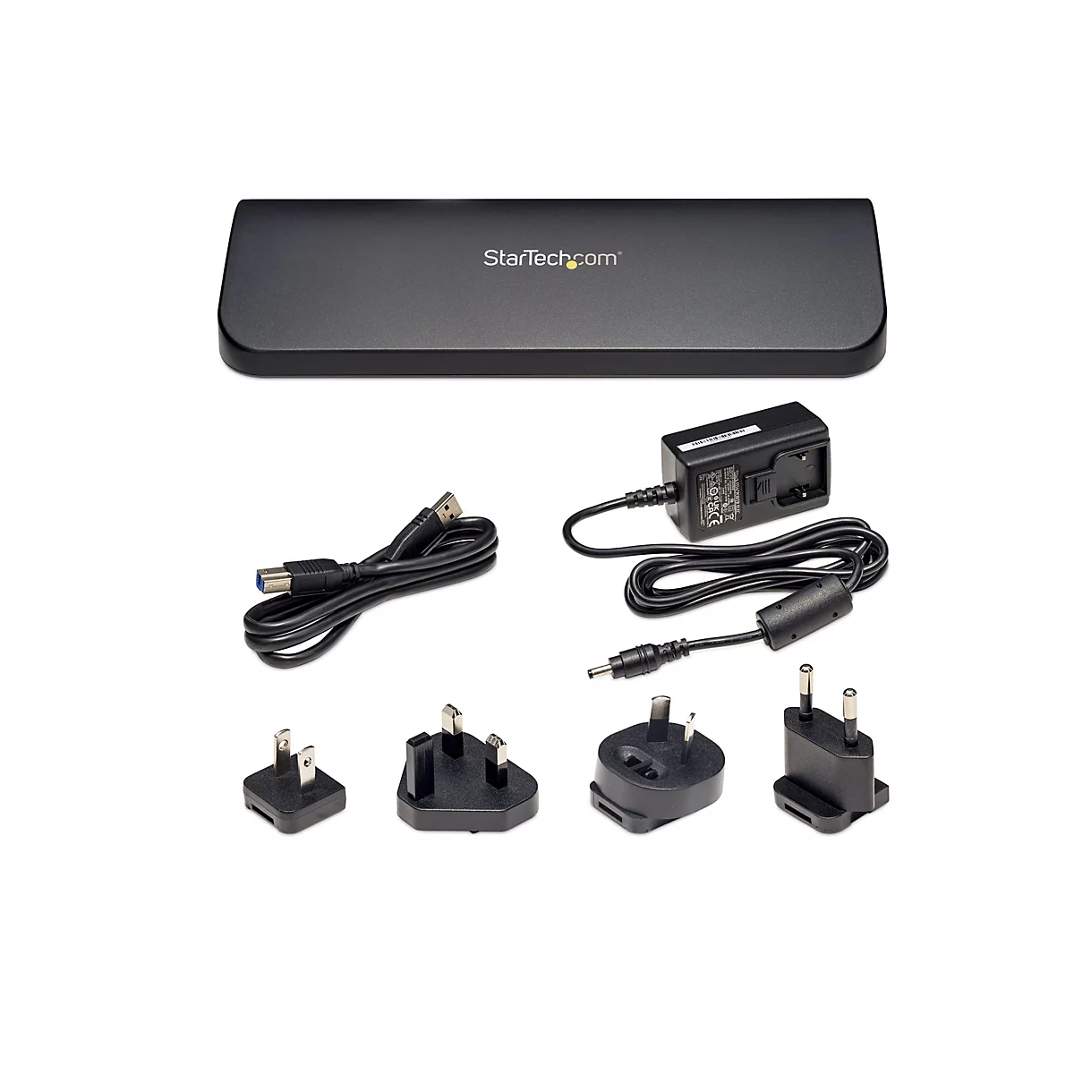 Schwarzes StarTech.com Dockingstation-Set mit Netzteilen und verschiedenen Steckern auf weißem Hintergrund.