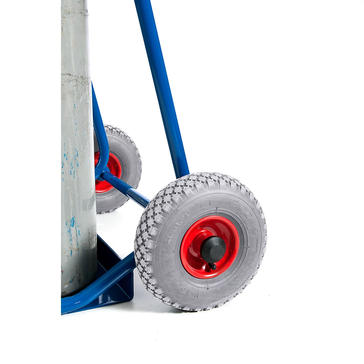 Blue gas cylinder cart with two grey wheels, red rims, and a silver gas container. The detail shows the wheels and the cart.