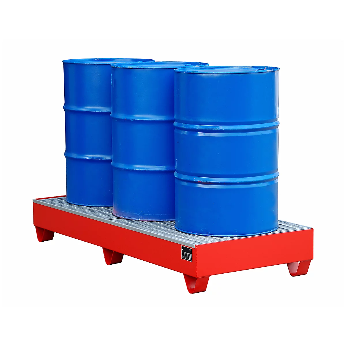 Three blue barrels stand on a red drip tray with a grid.