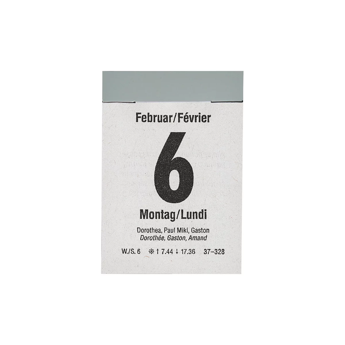 Page de calendrier montrant le 6 février. La date est indiquée en allemand et en français, de même que le jour de la semaine, lundi.