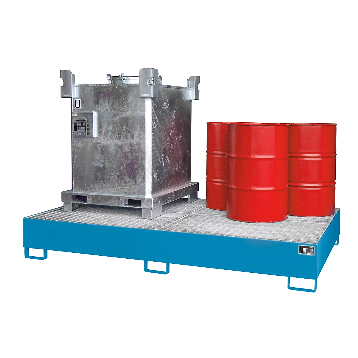 A container and red barrels on a blue metal platform. The surface is rastered.