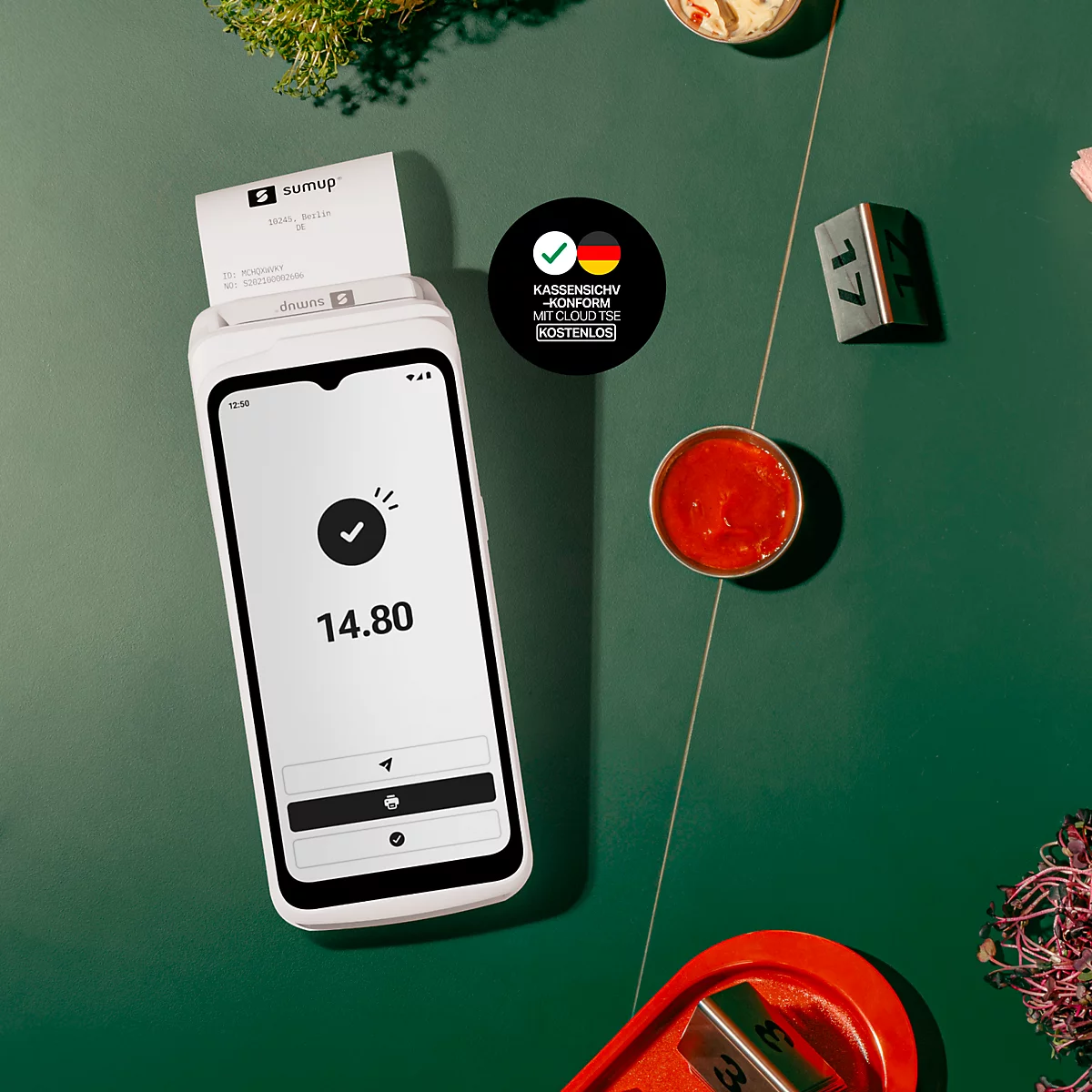 SumUp Kassensystem auf grünem Hintergrund mit einer erfolgreichen Transaktion über 14,80 Euro.