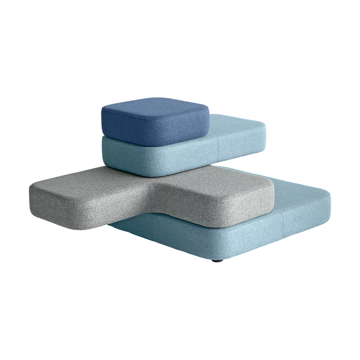 Multicoloured modular seating. Various shapes and shades of blue, grey and turquoise, stacked.