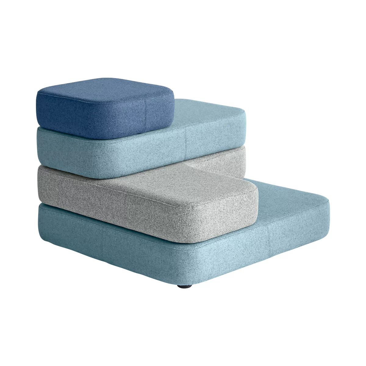 Stacked seat cushions in blue and gray tones. The cushions are square and rectangular, forming an abstract shape.