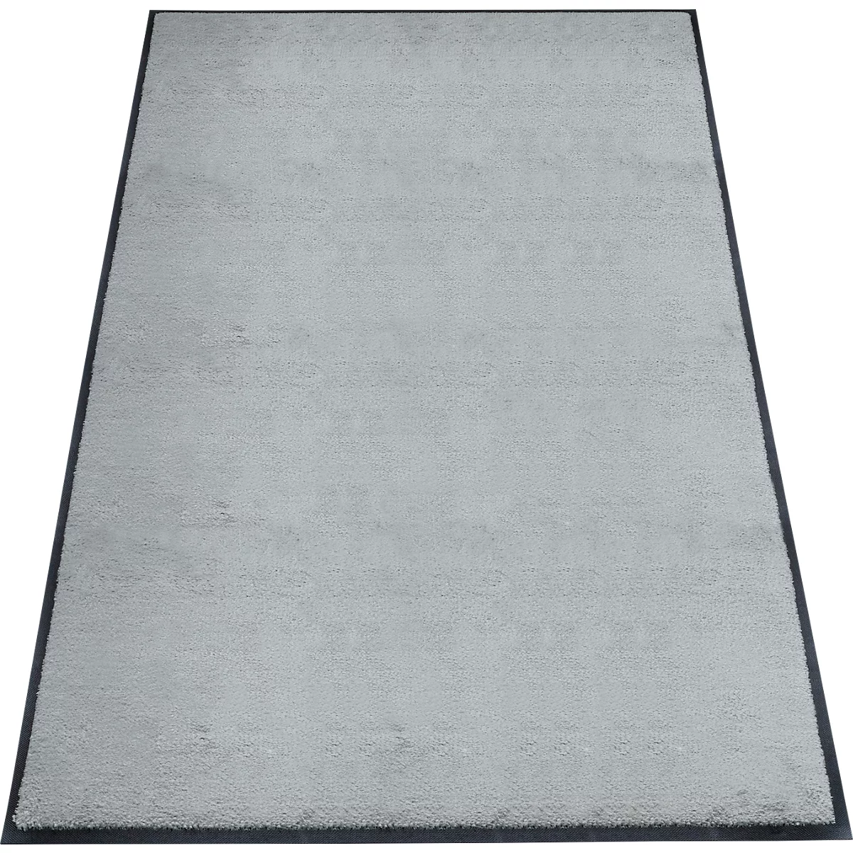 Tapis gris clair avec une bordure noire. Pris d'une perspective haute.