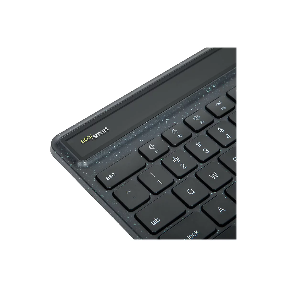 Gros plan sur un clavier noir. Le cadre a un motif moucheté. Les touches "esc", "tab", "1", "2", "3", "Q", "W", "A", "lock" sont visibles sur le clavier.