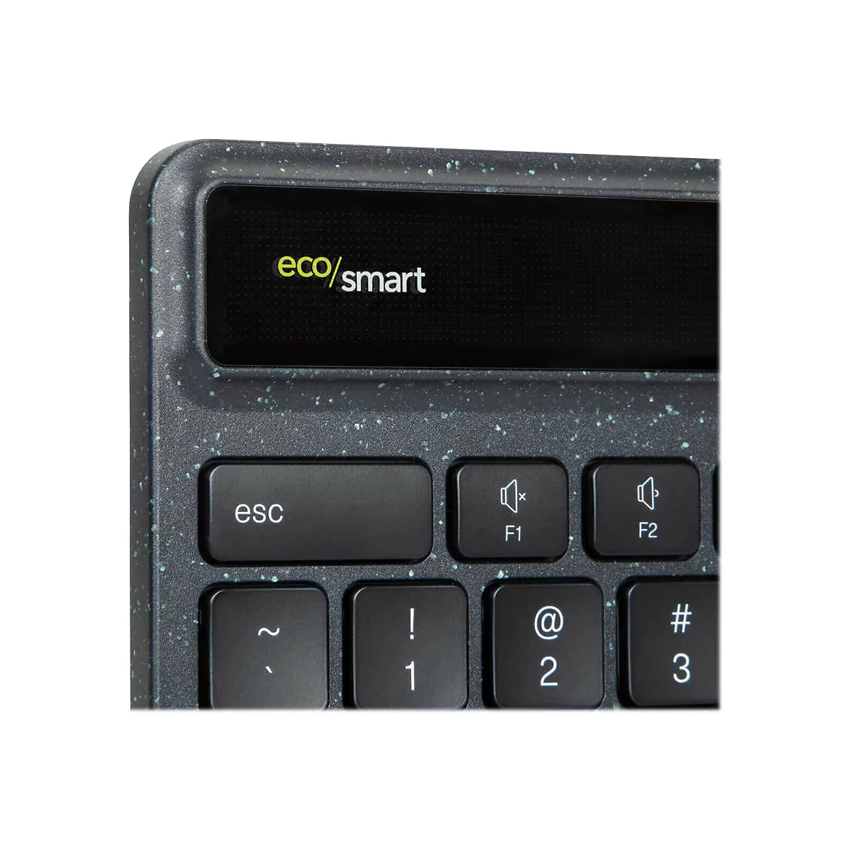 Gros plan sur un clavier. Touches noires avec lettrage blanc, dont la touche Esc et les touches de fonction. En haut à gauche, il est écrit "eco/smart".