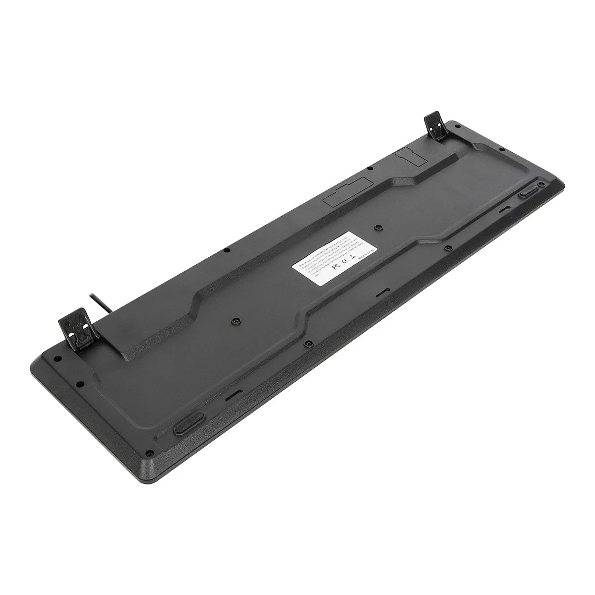Schwarze Tastaturunterseite, Kabelanschluss, Herstelleraufkleber, weiße Oberfläche.