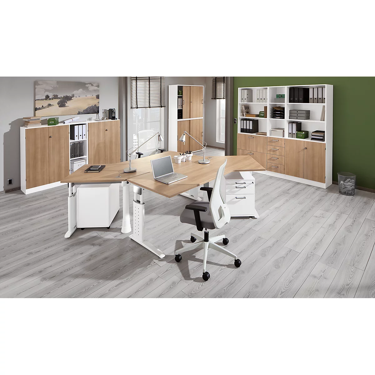 Modern office with light wood desk and cabinets. A laptop is ready. An office chair stands in front of it.