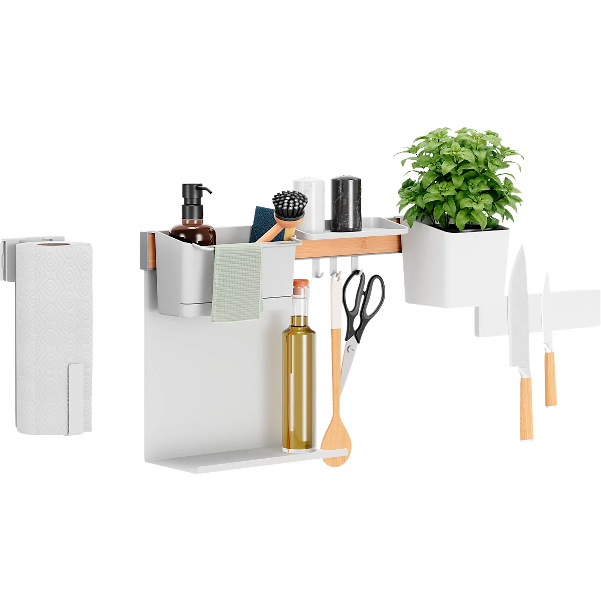 Étagère de cuisine blanche avec accessoires: distributeur de savon, herbes, couteaux. Porte-rouleau de papier à droite.