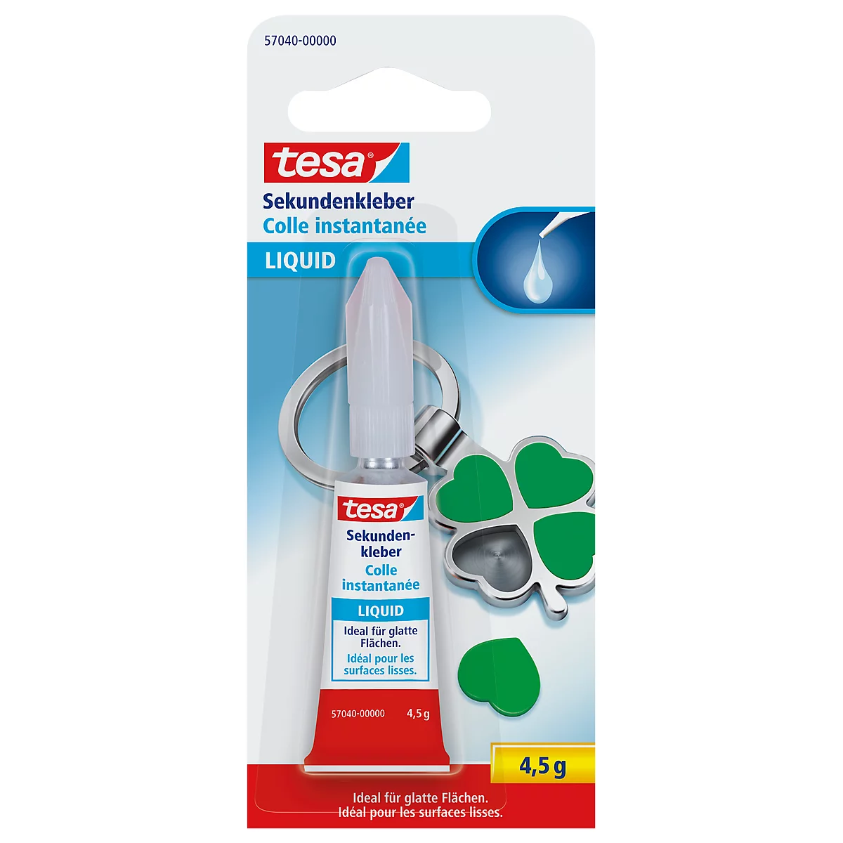Close-up of a tube of Tesa super glue with a clover-shaped key ring. The glue has a red and white hue, with German and French inscriptions.