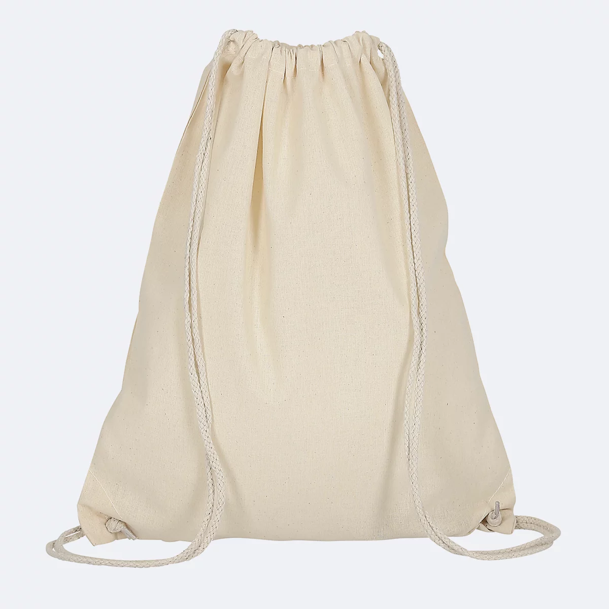 Beige stoffen tas met trekkoorden.