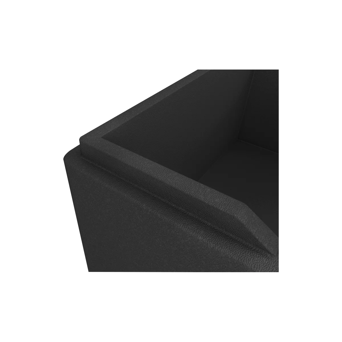 Gros plan sur une boîte noire texturée, vue de dessus, avec le bord intérieur visible.