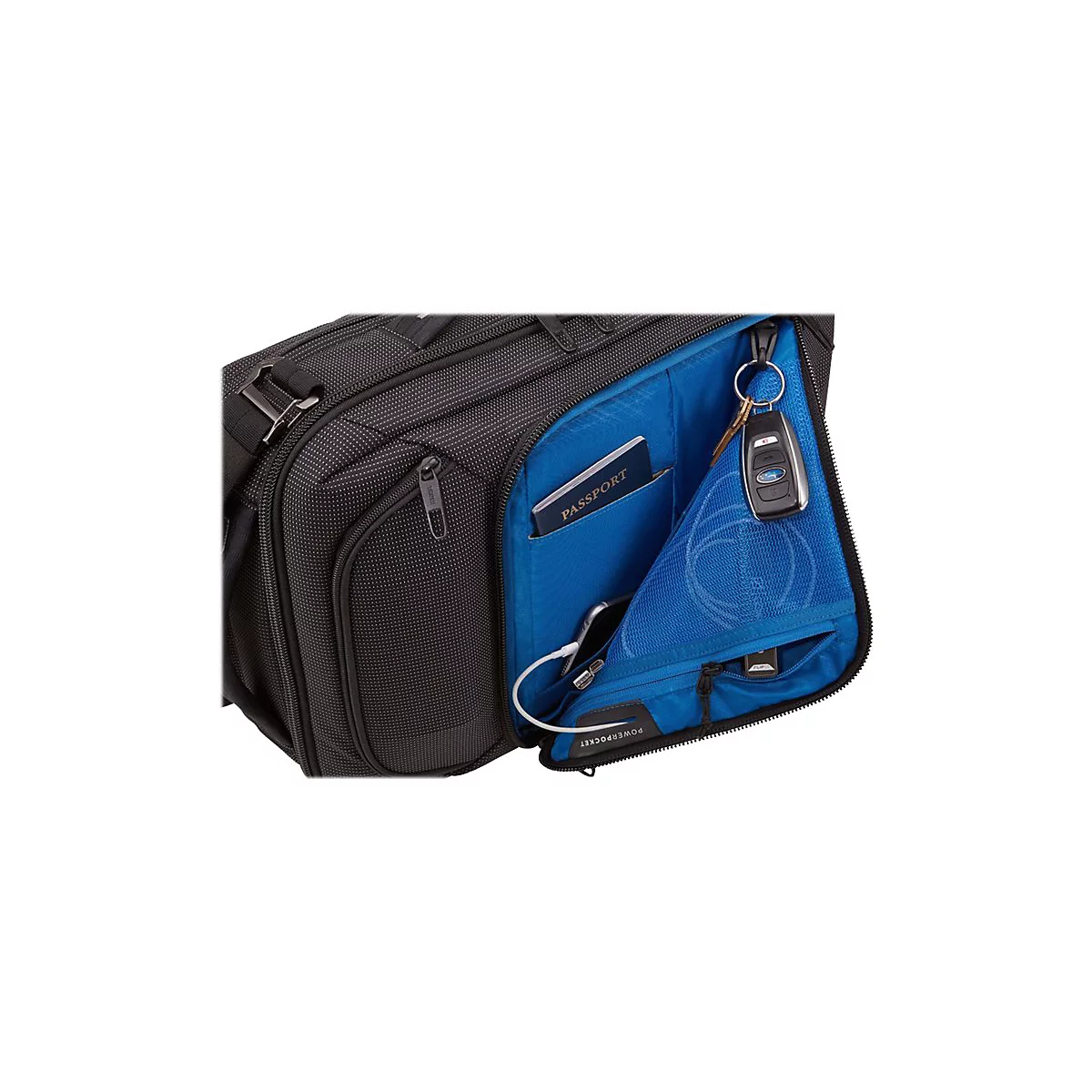Schwarze Aktentasche mit blauer Innenseite. Innen: Reisepass, Schlüssel, Handy, Ladekabel.