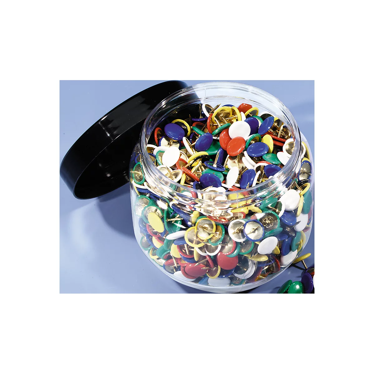 A clear jar full of colorful push pins, with an open black lid.