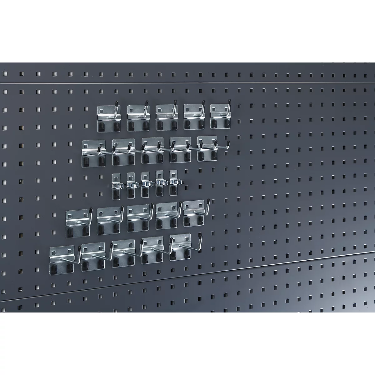 Metal pegboard with hooks in different sizes.