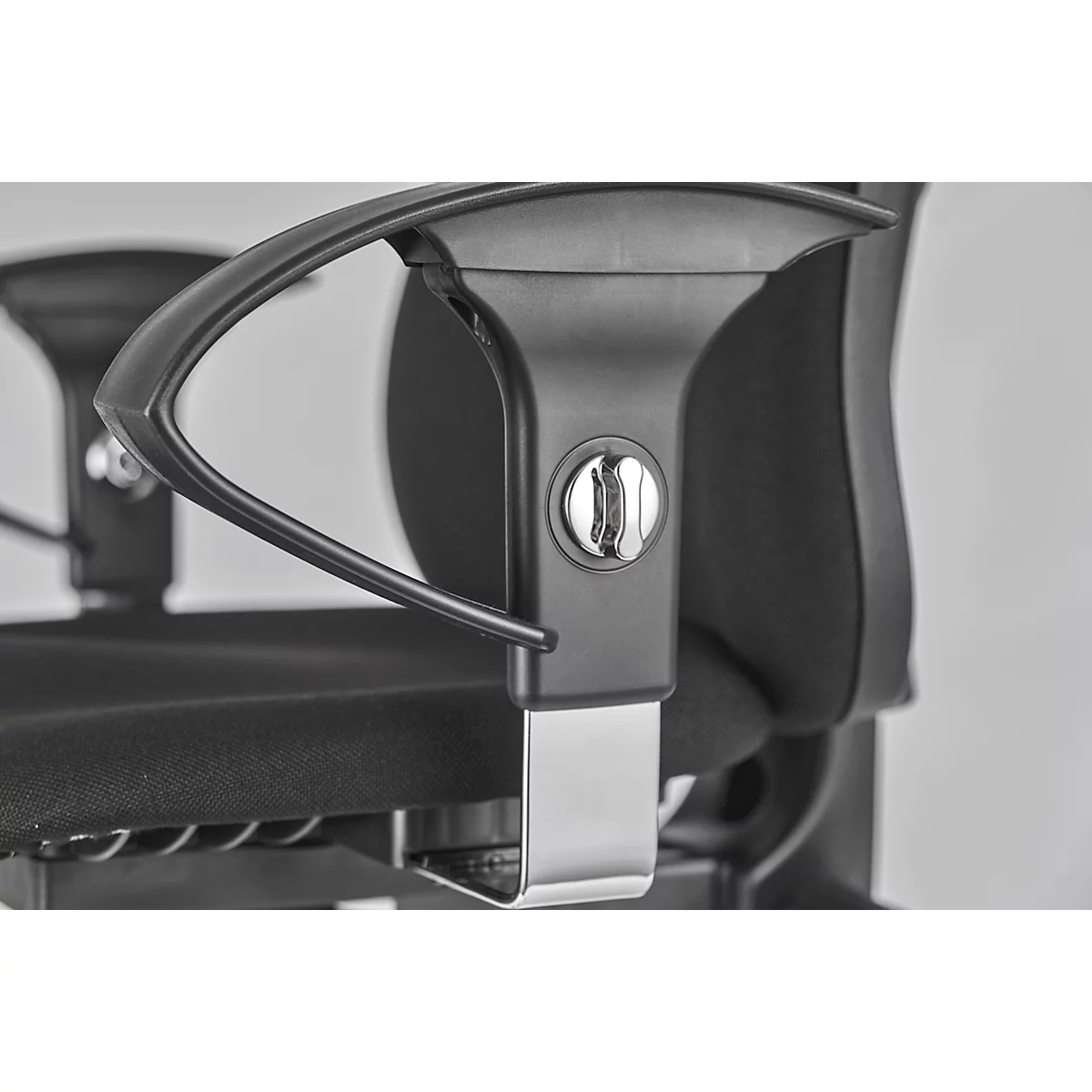 Close-up of the black armrest mechanism of an office chair, with metallic details and a visible adjustment knob.