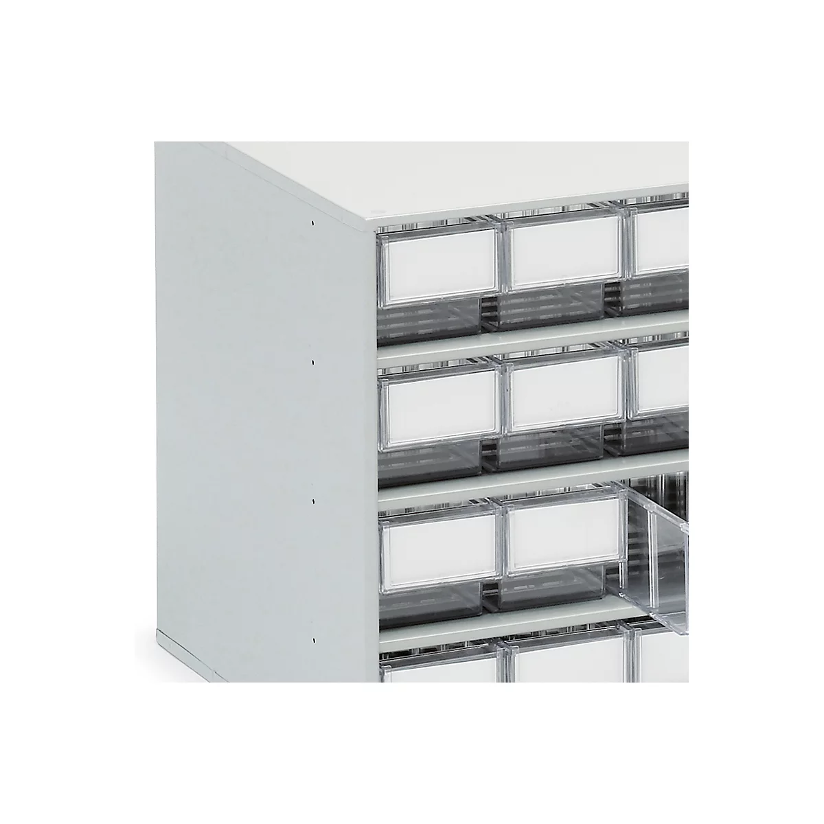 Grey drawer system with white labels, one drawer is open.