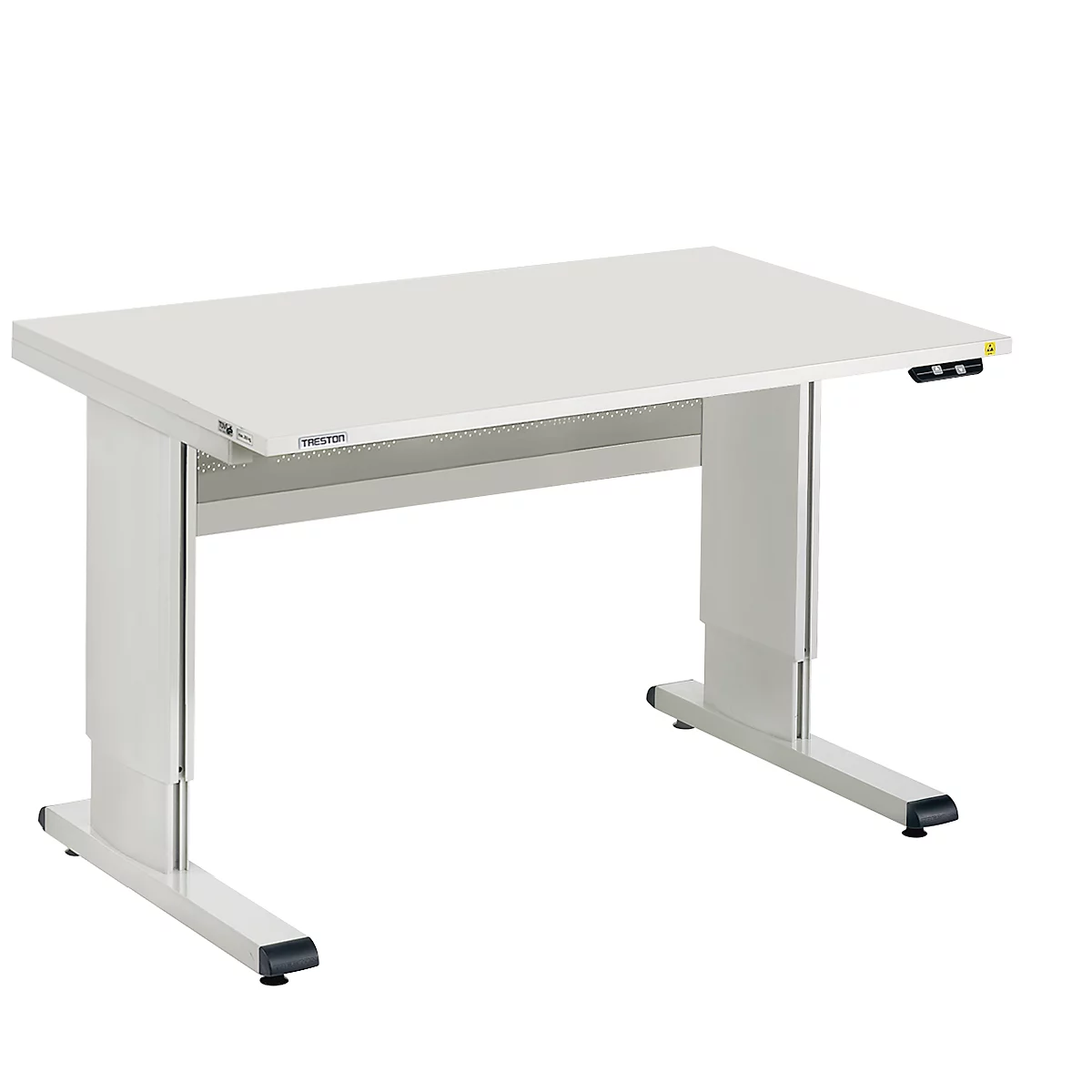 A height-adjustable white desk with gray legs and black feet. The text "TREIBAU" is visible on the table top.