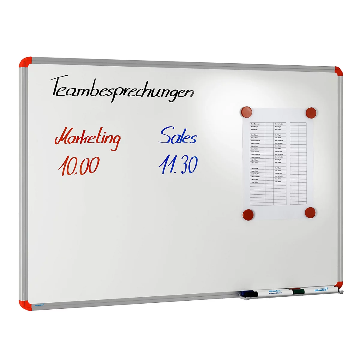 Ein weißes Whiteboard mit rotem Rahmen an den Ecken. Es trägt handgeschriebene Termine und ein angeheftetes Blatt Papier.
