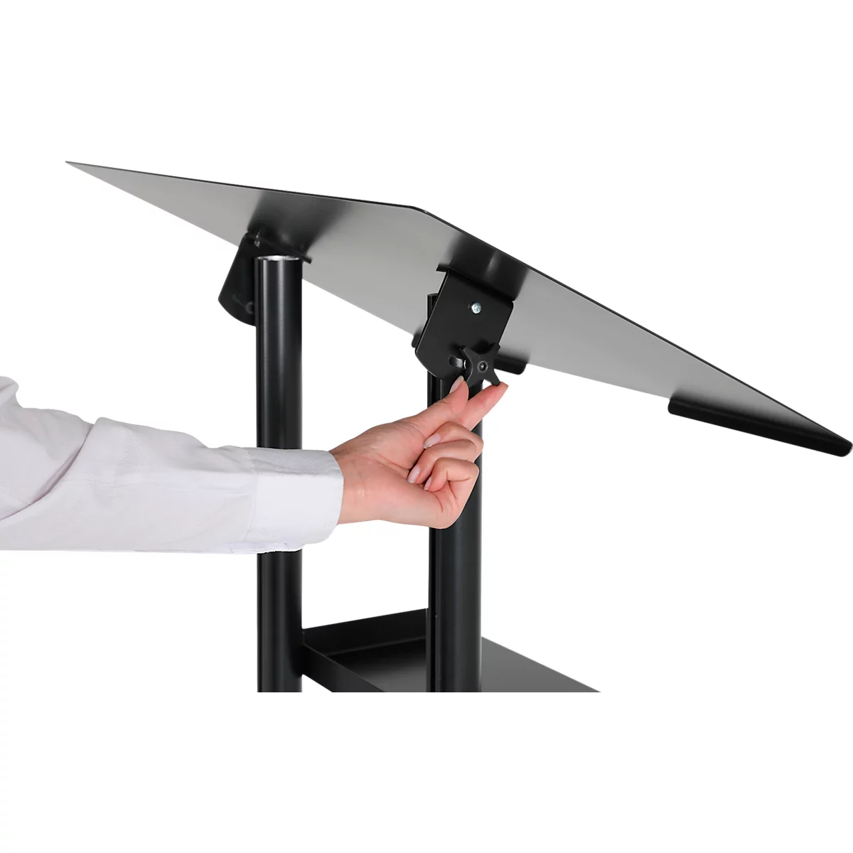 A person adjusts a black lectern table. The table has a slanted, adjustable writing surface.