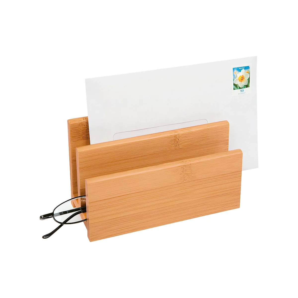 Bamboo letter tray with two compartments. A white letter with a stamp is in one compartment, and glasses in the other.