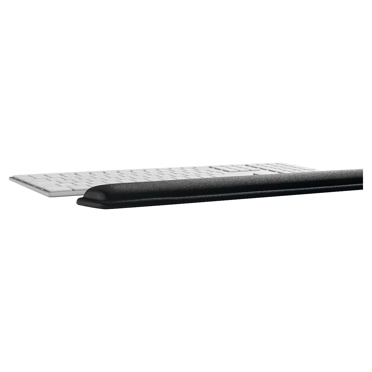 A black wrist rest rests in front of a white keyboard.