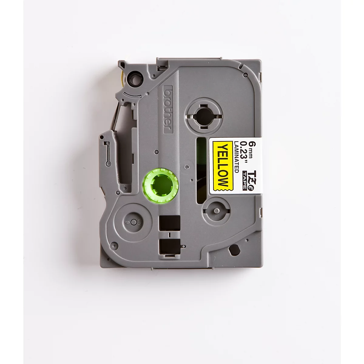 Gray label dispenser with yellow sticker. The sticker says "YELLOW" and other technical details.