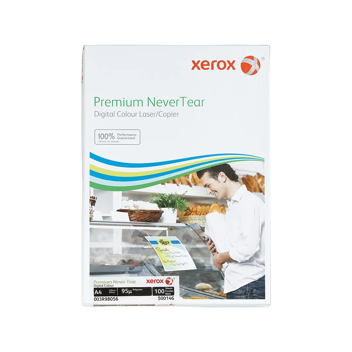 Man in bakery holding paper. The product says 'Premium Never Tear'.