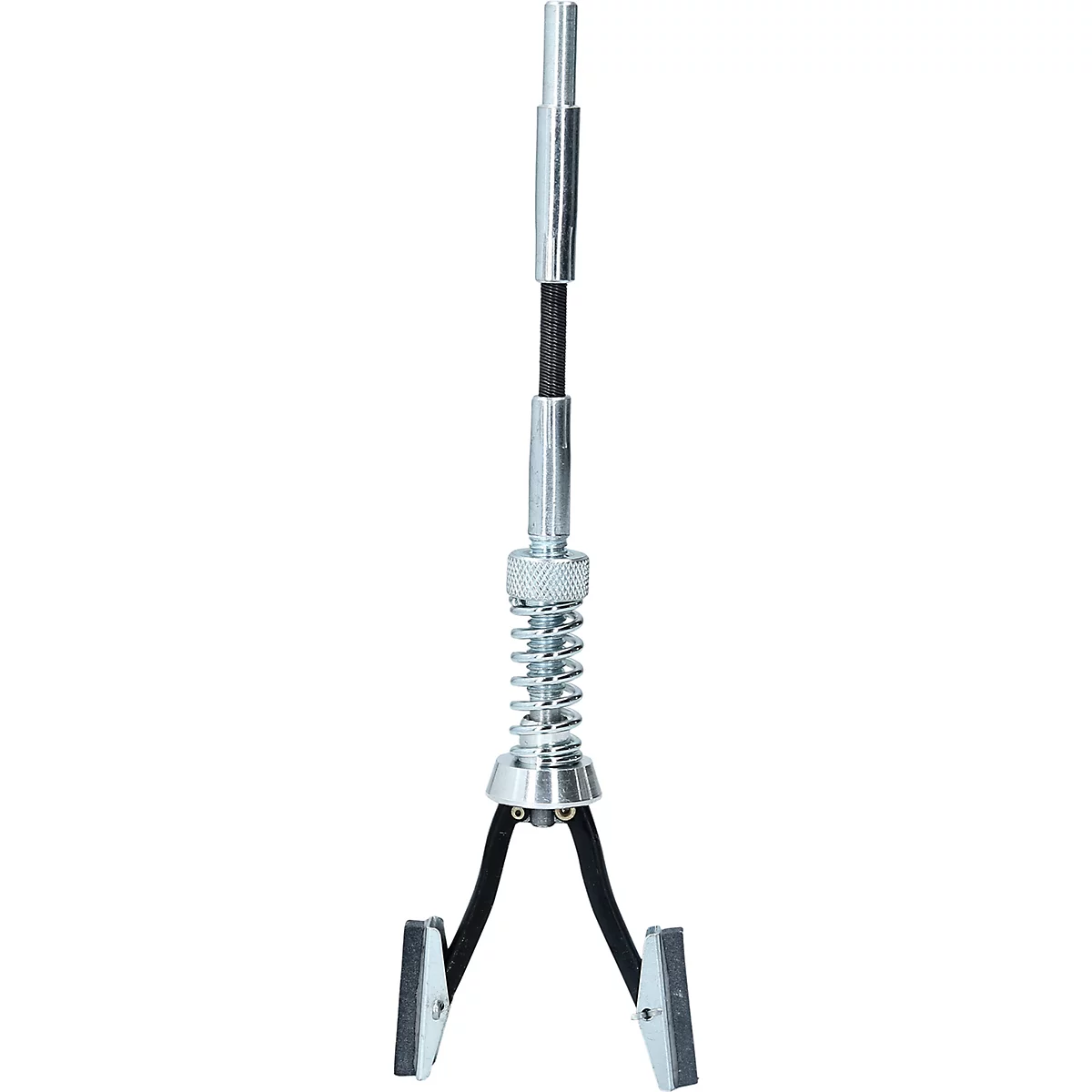 Ein Werkzeug für die Zylinderhonung, mit Federmechanismus und Schleifsteinen.