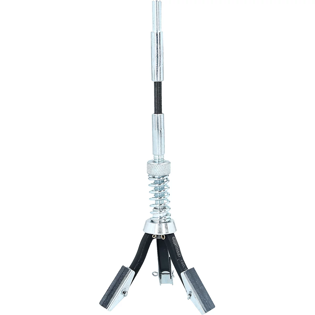 Zylinderhonwerkzeug mit drei Schleifsteinen. Feder und drehbare Halterung.