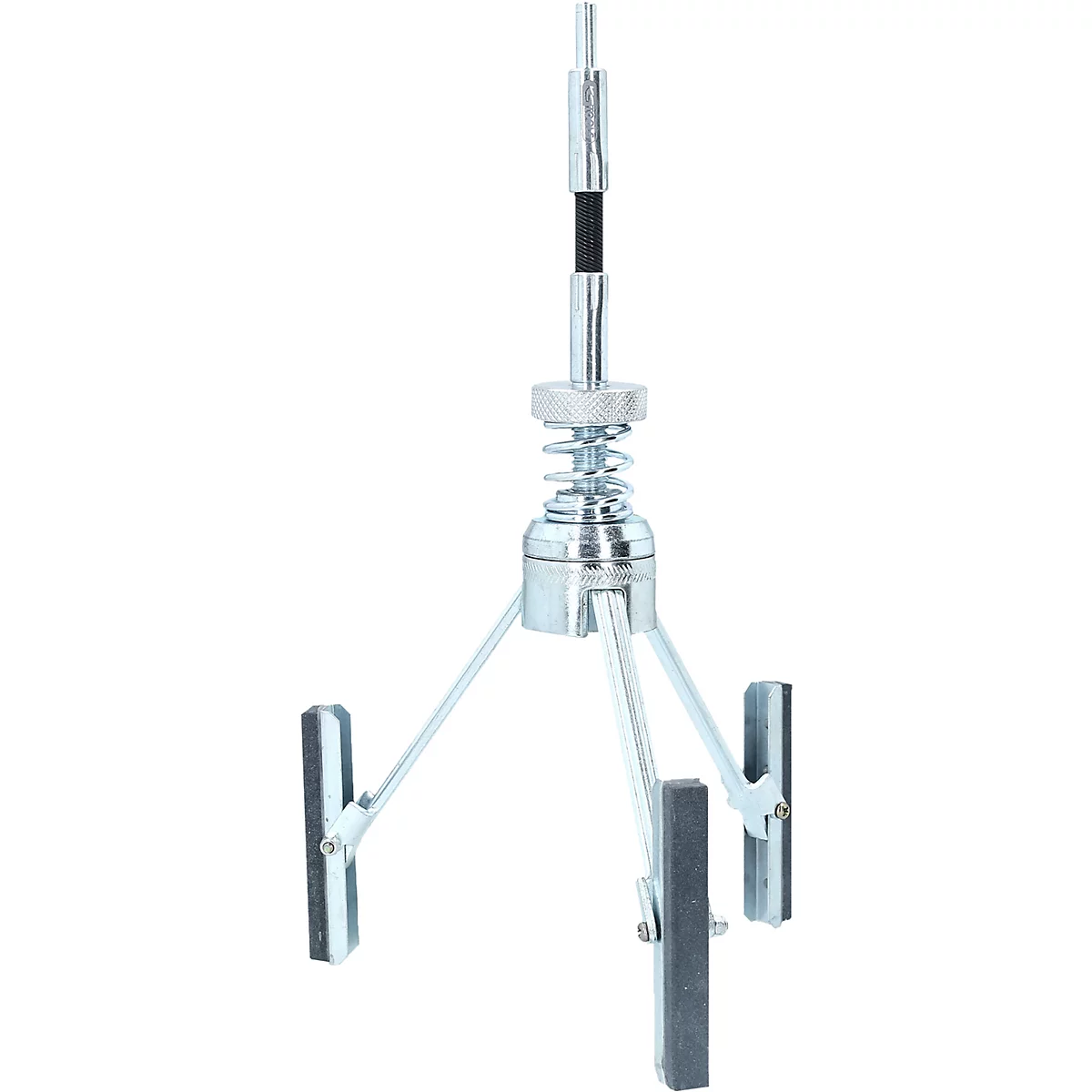 Ein Werkzeug, das aus Metallstangen, einer Feder und Schleifsteinen besteht.